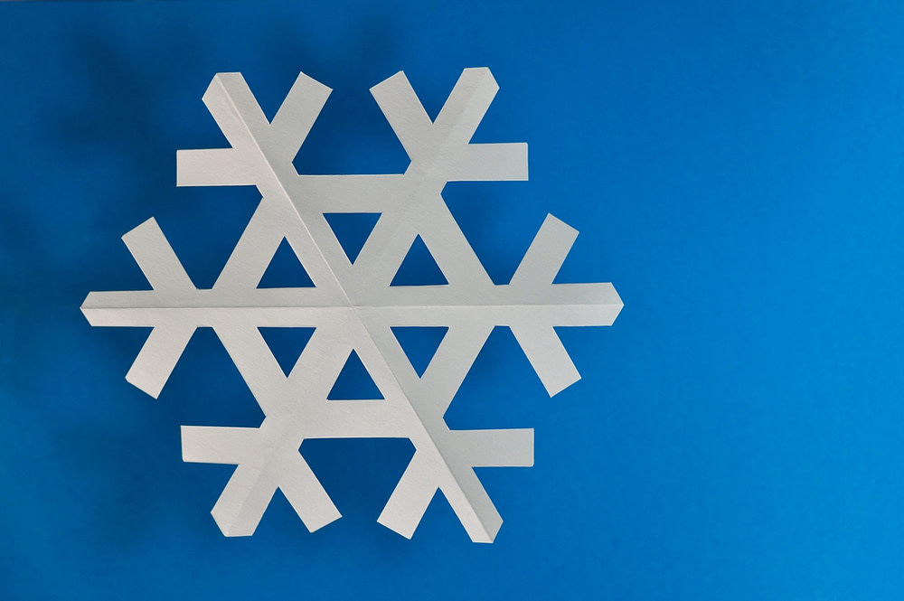 A paper snowflake that can be used to motivate children during music practice
